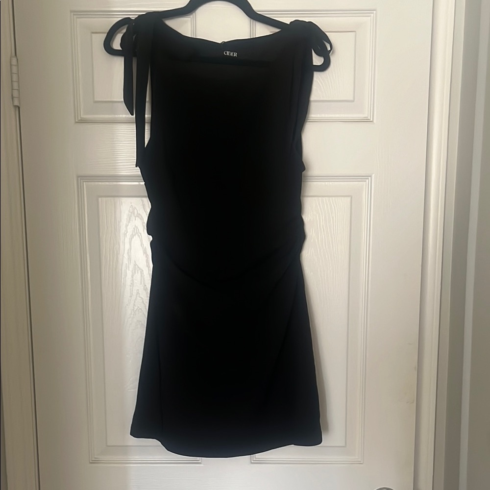 Black fitted dress with tie bow straps
